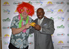 Mango mascot and Perno Young with Wakefern Food Corporation smile for the camera. Wakefern received the Mango Retailer of the Year Award.